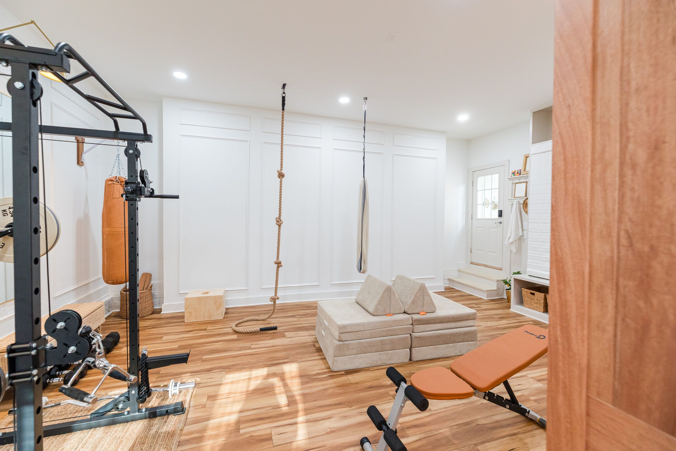 Garage gym with weights and warm light